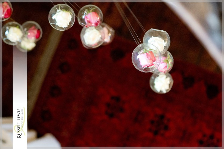 floating roses in glass baubles