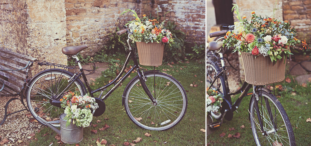 Vintage bicycle with basket of flowers