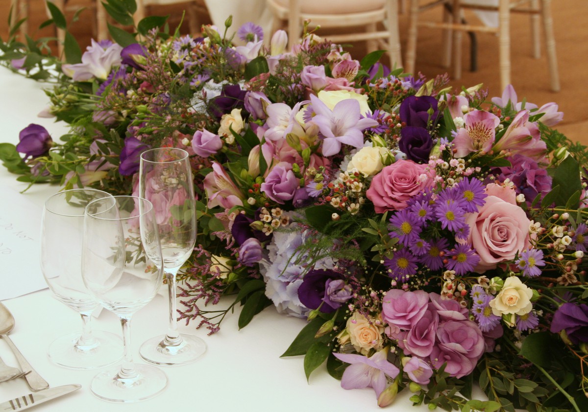 pink purple and lilac top table arrangement