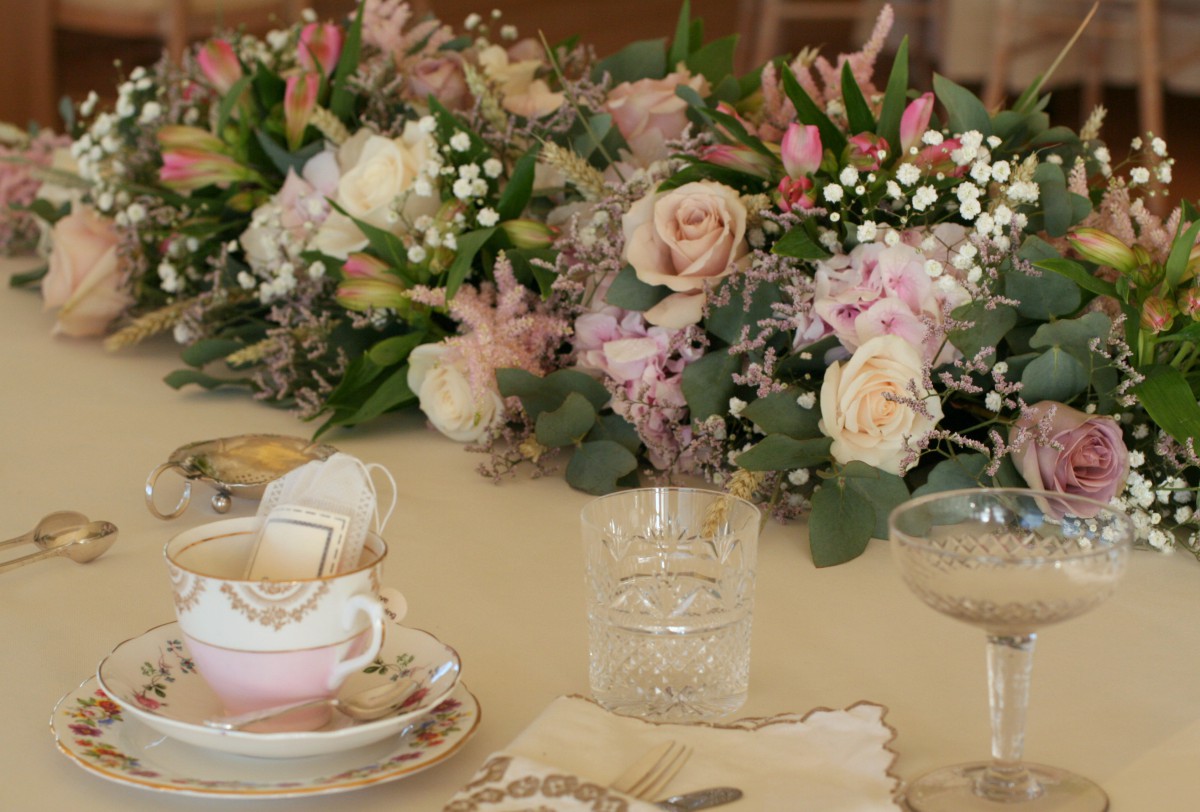 top table flowers for a vintage tea party wedding