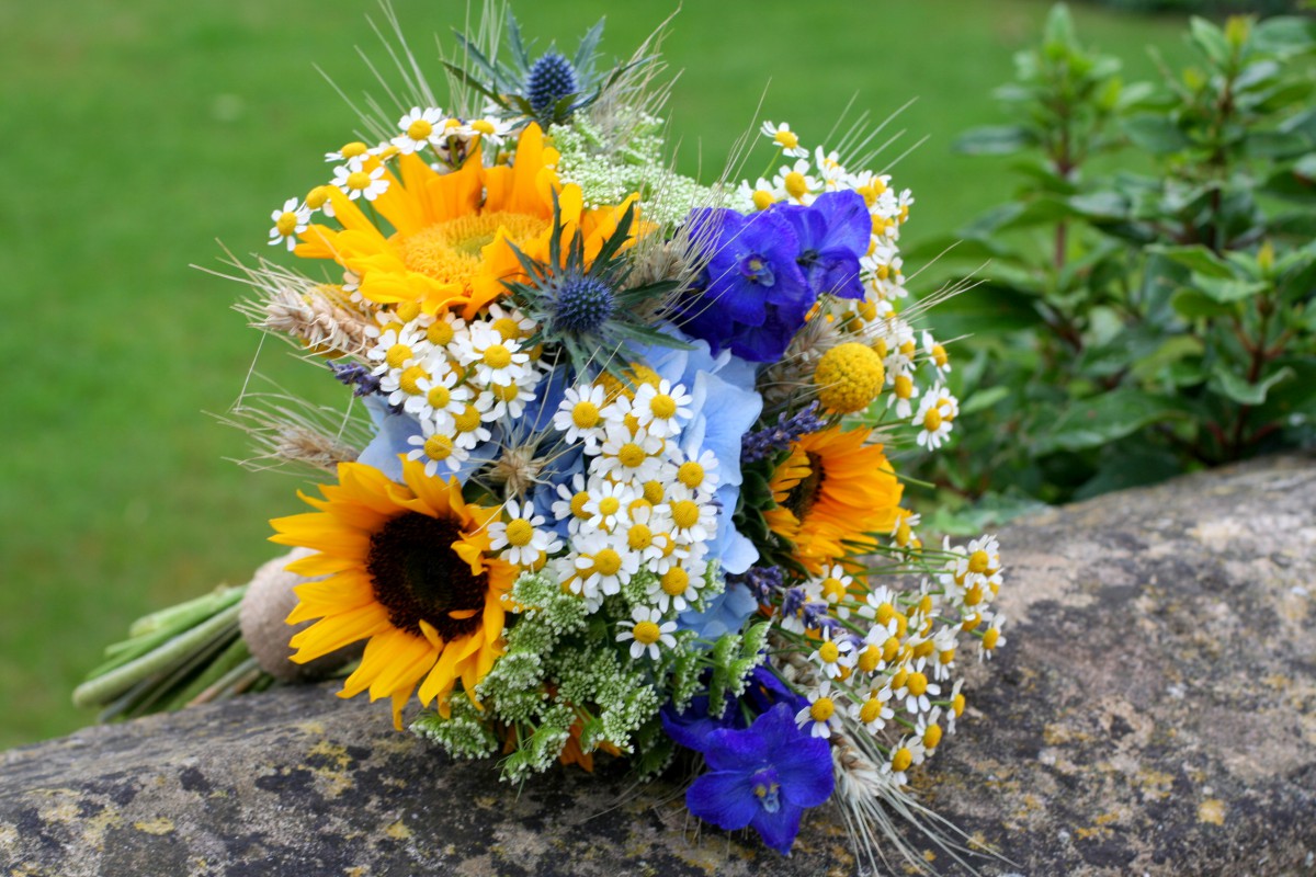 sunflower yellow and blue bridesmaids bouquet
